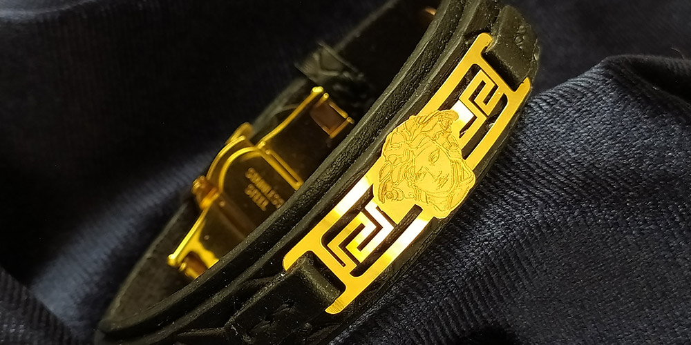 دستبند چرم و طلا